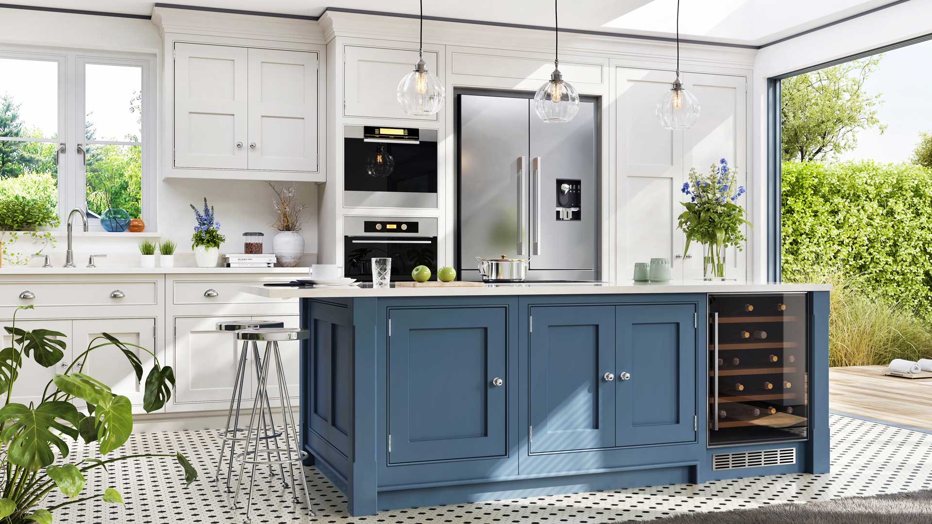 Kitchen with many indoor plants, lots of natural light, stainless steel refrigerator and two wall ovens